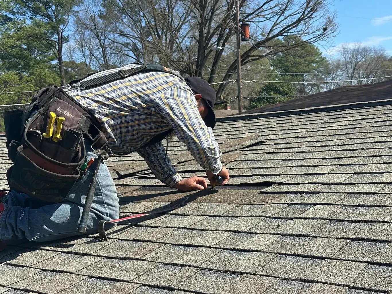 Professional roof repair crew working in Birmingham